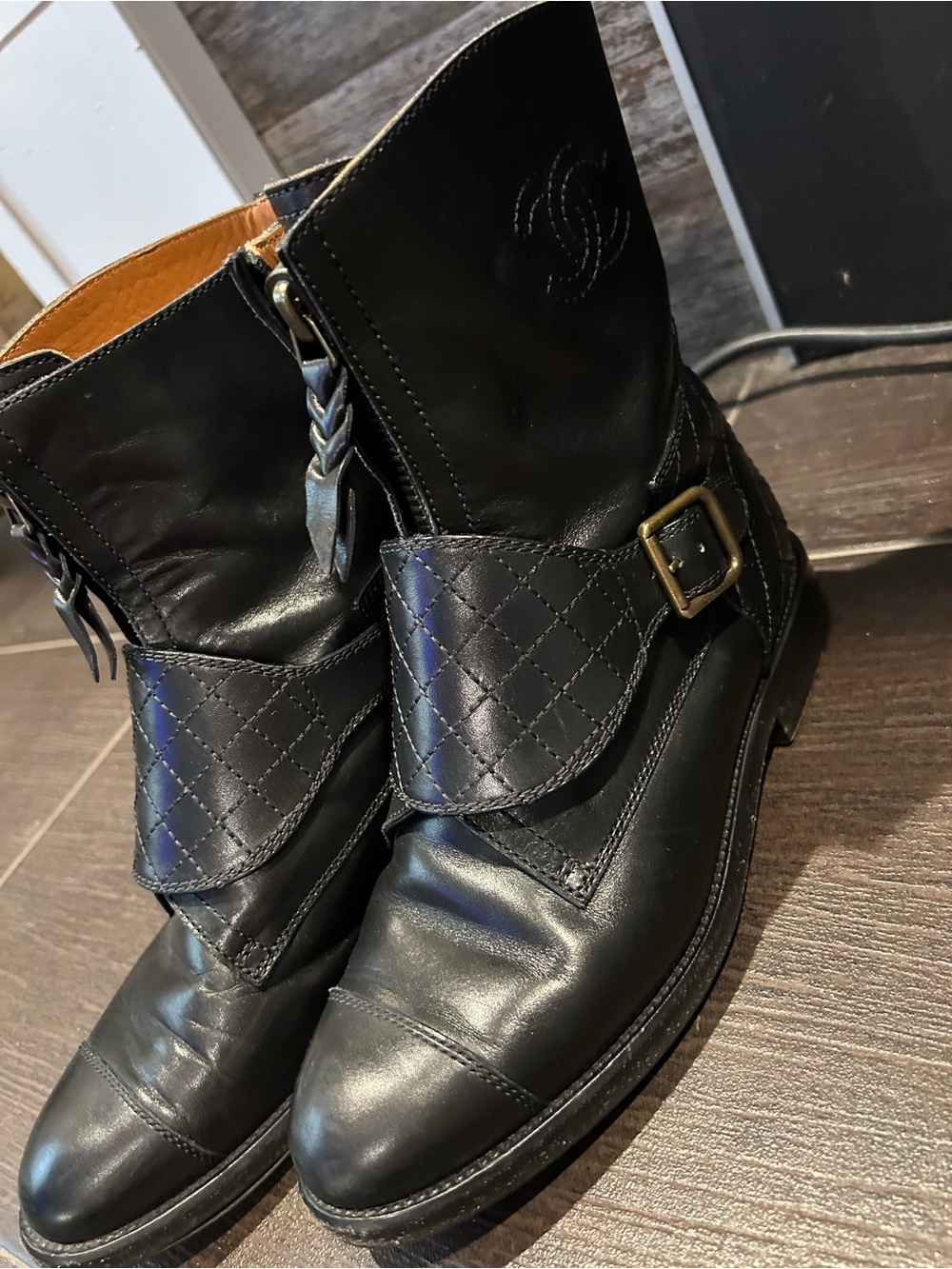 Authentic CHANEL Black Quilted Strap Leather Ankle Boots with Gold Buckle